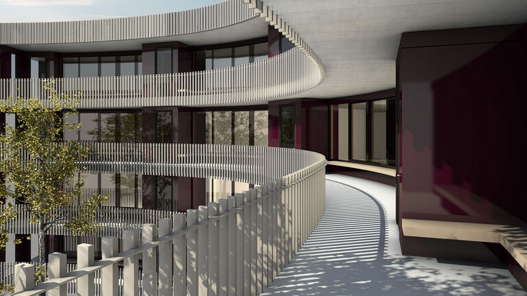 In den konkaven Rundungen der Gebäude, zwischen jeweils zwei Steigzonen, befinden sich auf jeder Etage Laubengänge mit Erschliessungsfunktion.