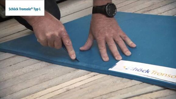 Schallbrückenfreier Einbau bei gewendelten Ortbeton-Treppenläufen