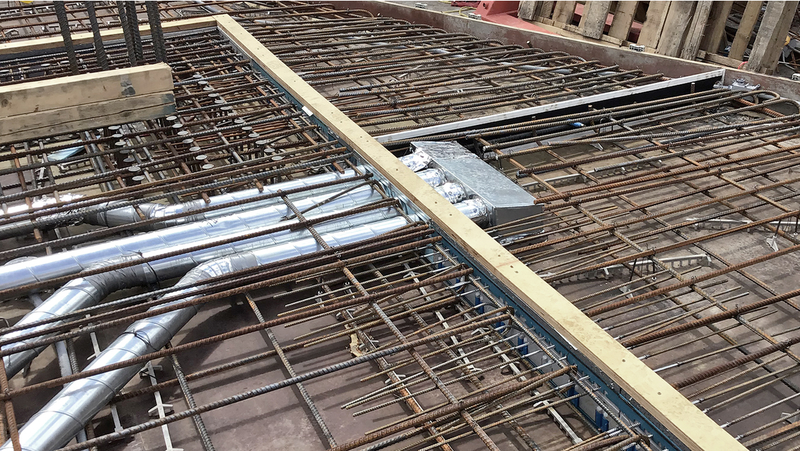 Thermal breaks with in-slab ducts at 1500 Maisonneuve Thermal break installation with in-slab ducts at 1500 Maisonneuve